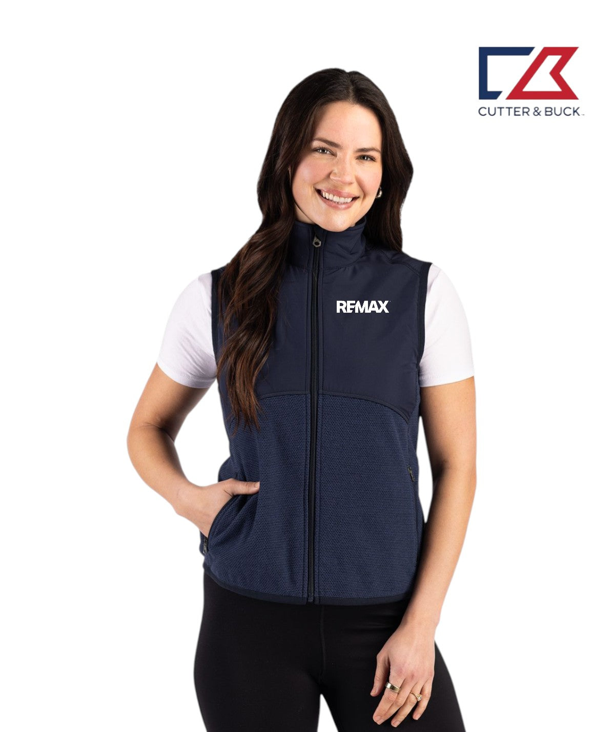 Woman wearing a navy vest with 'REMAX' logo on a white background, featuring the Cutter & Buck logo.