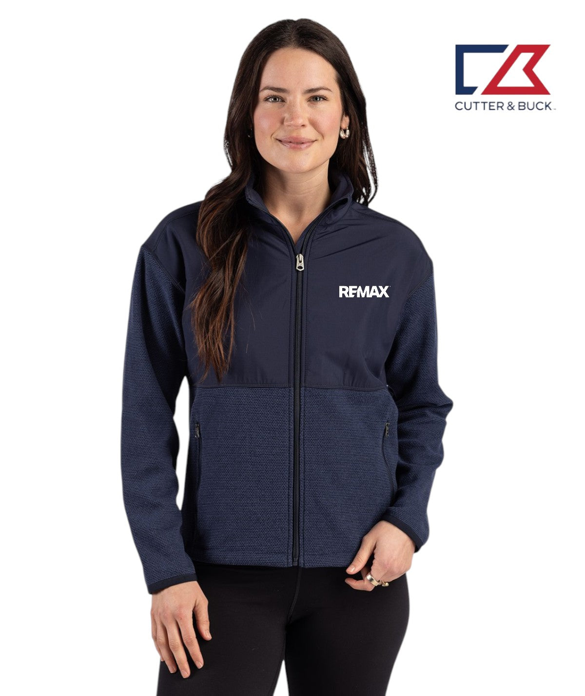 Woman wearing a navy blue jacket with REMAX logo on a white background, featuring the Cutter & Buck logo.