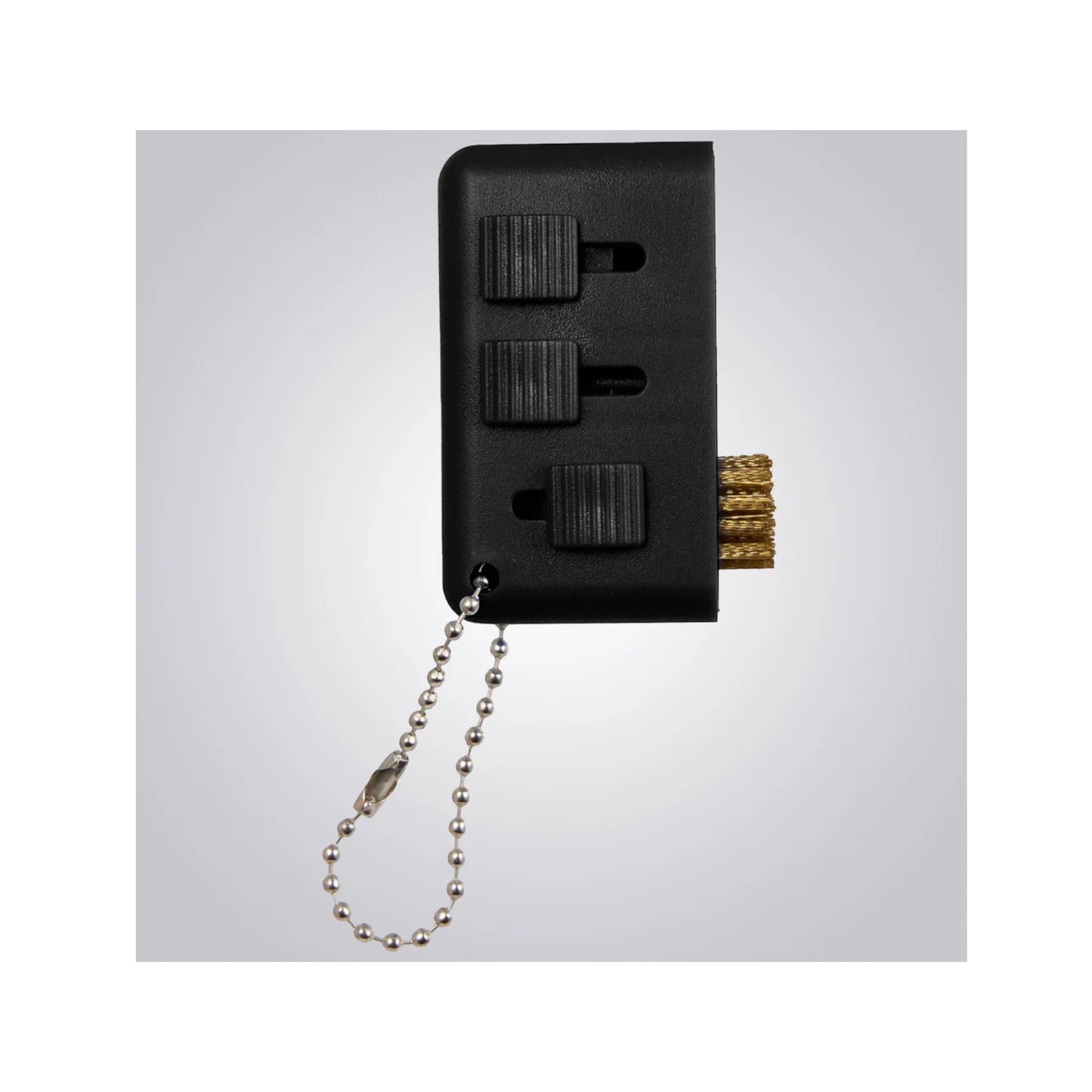 Black tool set with three components and a brush on a white background