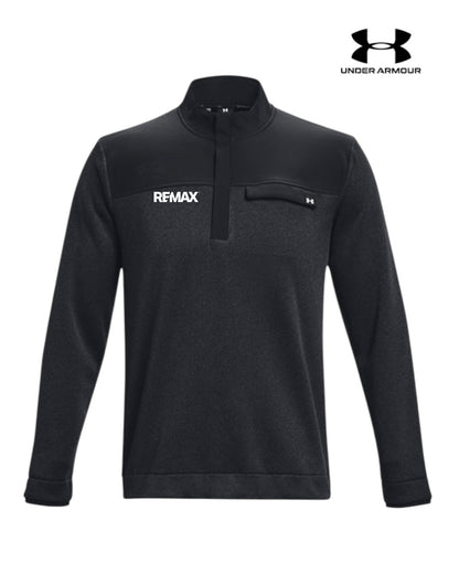 A black long-sleeve quarter-zip pullover from Under Armour, featuring a white 'REMAX' logo on the left chest and a small black Under Armour logo on the right chest pocket. The Under Armour brand logo is also displayed in the top right corner of the image.