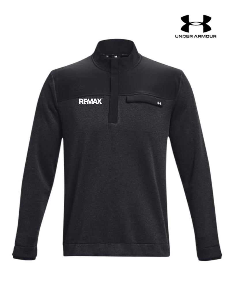 A black long-sleeve quarter-zip pullover from Under Armour, featuring a white 'REMAX' logo on the left chest and a small black Under Armour logo on the right chest pocket. The Under Armour brand logo is also displayed in the top right corner of the image.