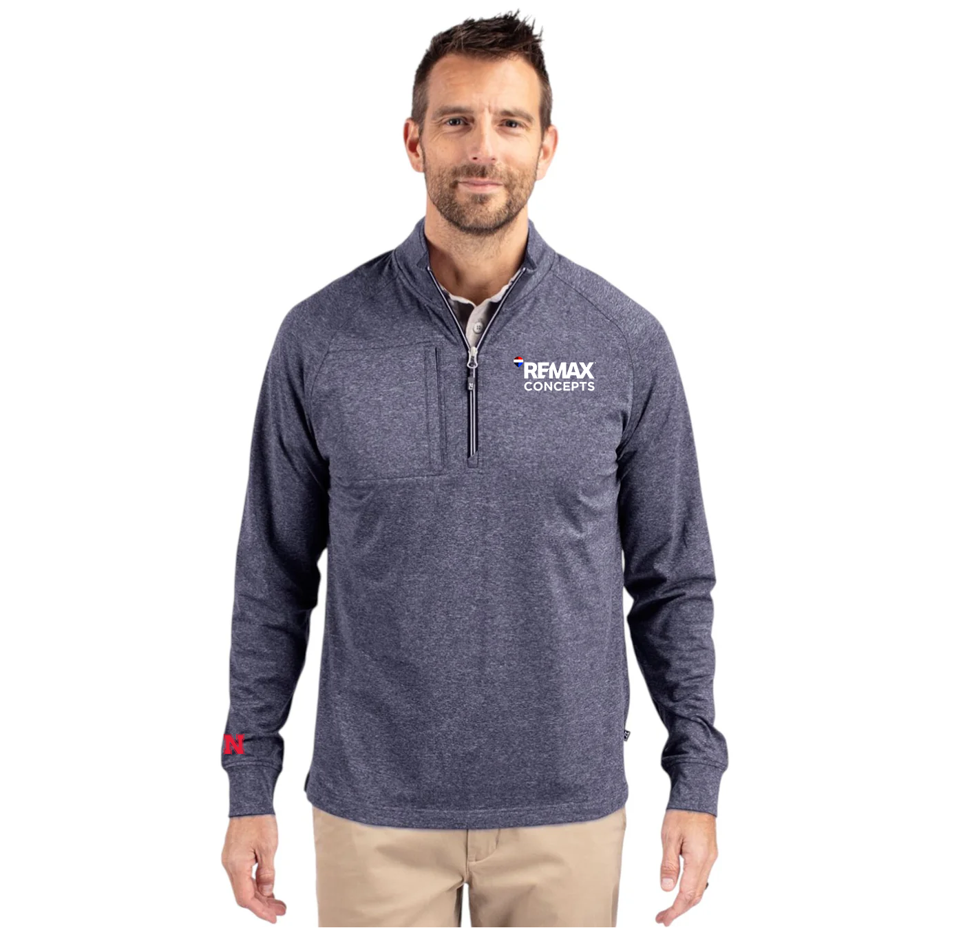 A man wearing a heathered navy blue quarter-zip pullover with a white REMAX CONCEPTS logo on the left chest, paired with khaki pants, against a plain white background.