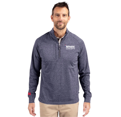 A man wearing a heathered navy blue quarter-zip pullover with a white REMAX CONCEPTS logo on the left chest, paired with khaki pants, against a plain white background.