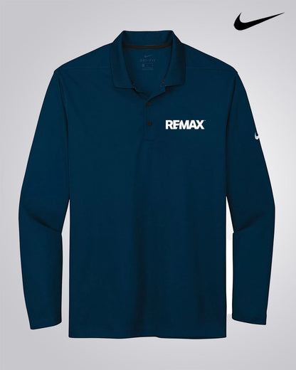 A dark navy long-sleeve polo shirt with 'REMAX' printed in white on the left chest, featuring a white Nike swoosh on the right sleeve and a black Nike swoosh logo in the top right corner of the image, set against a light gray background.