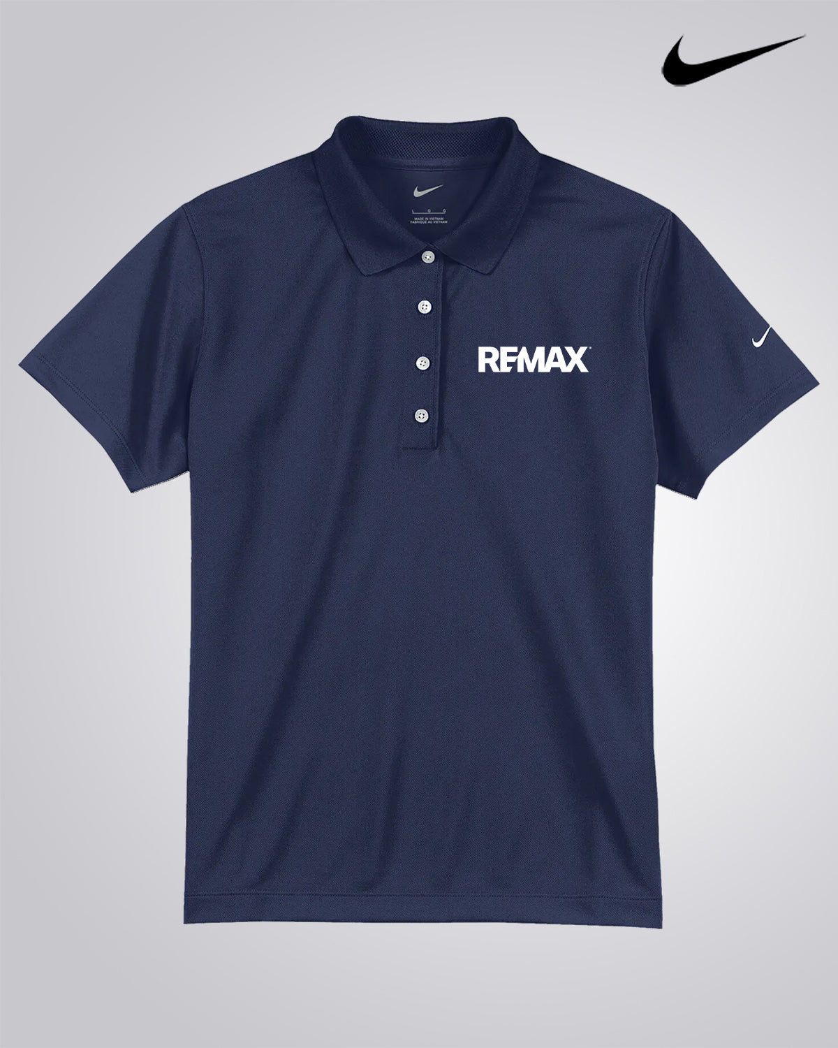 A navy blue Nike polo shirt with a three-button placket, featuring a white 'REMAX' logo printed on the left chest and a white Nike swoosh on the right sleeve, displayed against a light gray background with a black Nike swoosh logo in the top right corner.