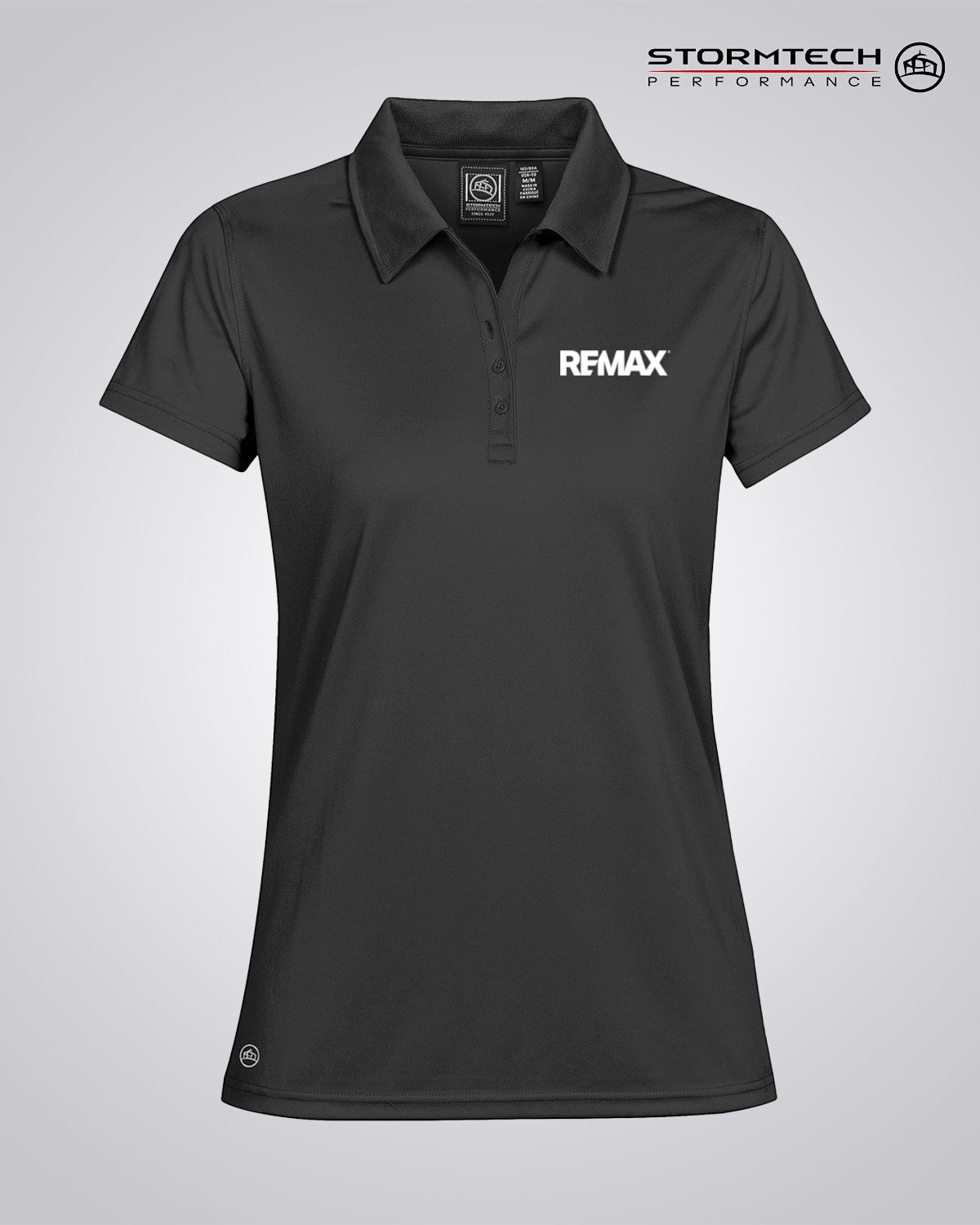 A dark gray short-sleeve polo shirt with a white REMAX logo on the left chest, displayed on a light gray gradient background with the Stormtech Performance logo in the top right corner.
