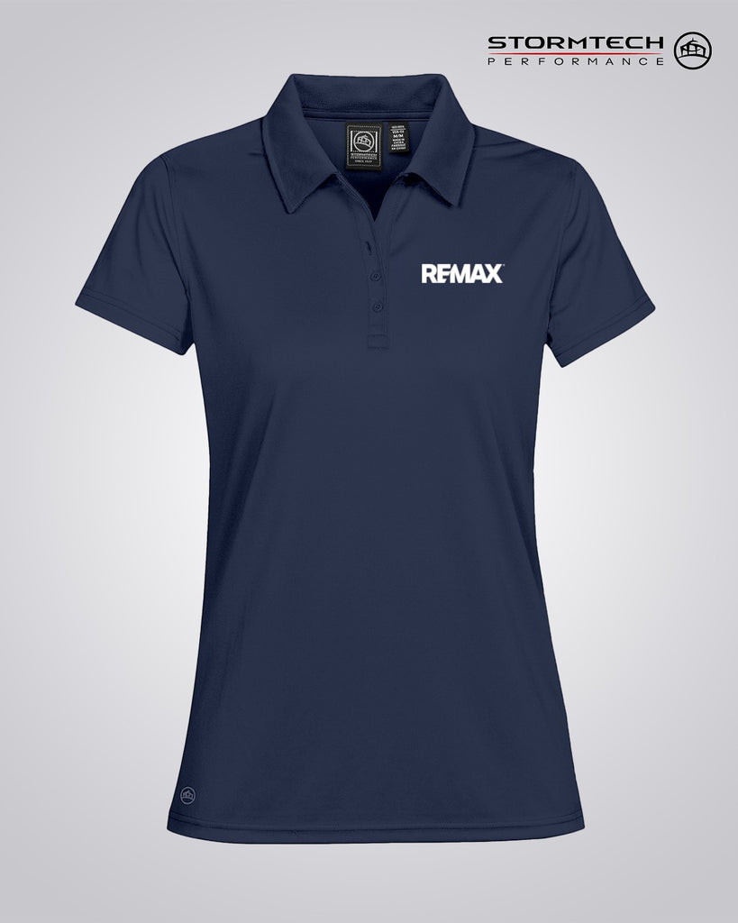 A navy blue short-sleeve polo shirt with a white REMAX logo on the left chest, displayed on a light gray gradient background with the Stormtech Performance logo in the top right corner.