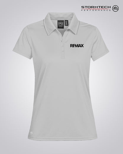 A light gray women's short-sleeve polo shirt with a black REMAX logo on the left chest, displayed on a neutral light gray background with the Stormtech Performance logo in the top right corner.