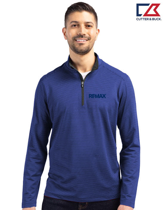 Man wearing a blue long-sleeve shirt with REMAX logo on a white background