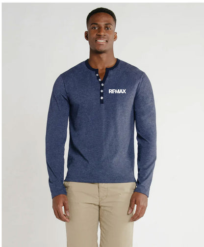 Man wearing a blue henley shirt with 'REMAX' logo on a light gray background