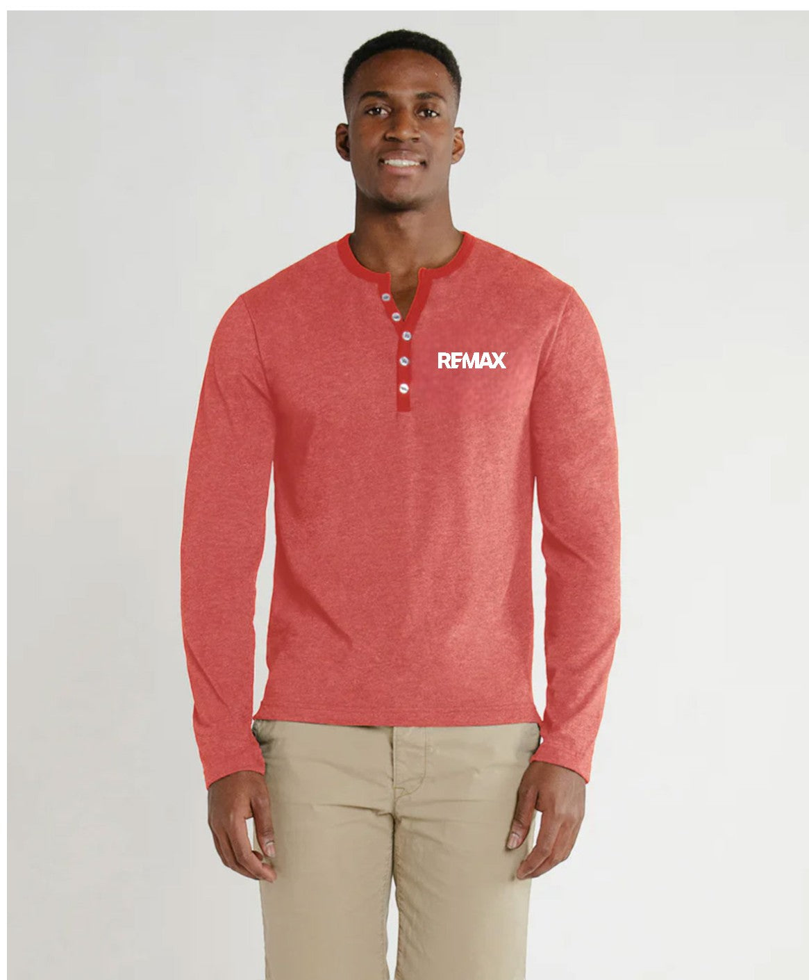 Man wearing a red long-sleeve shirt with 'REMAX' logo on a white background