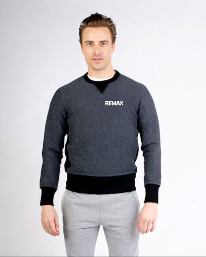 Man wearing a gray sweater with 'REMAX' logo on a white background
