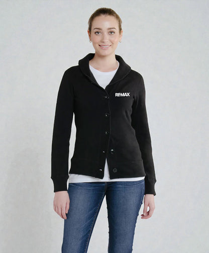 A woman modeling a black long-sleeve button-front cardigan with a hood and a white REMAX logo on the left chest, worn over a white top and blue jeans against a light gray studio background.