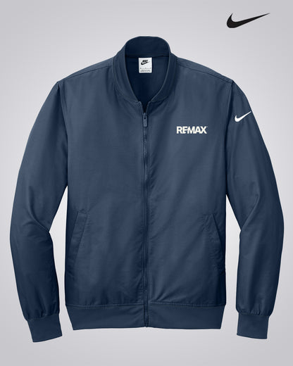 Navy blue jacket with 'REMAX' logo on a light gray background