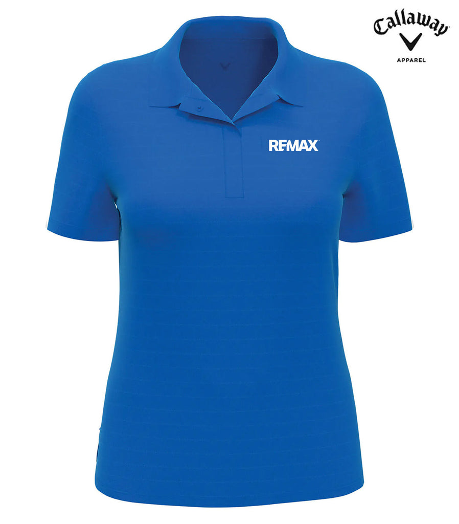 A royal blue short-sleeve polo shirt with a collar and a white 'RFMAX' logo printed on the left chest, shown on a plain white background. The Callaway Apparel logo is visible in the top right corner.