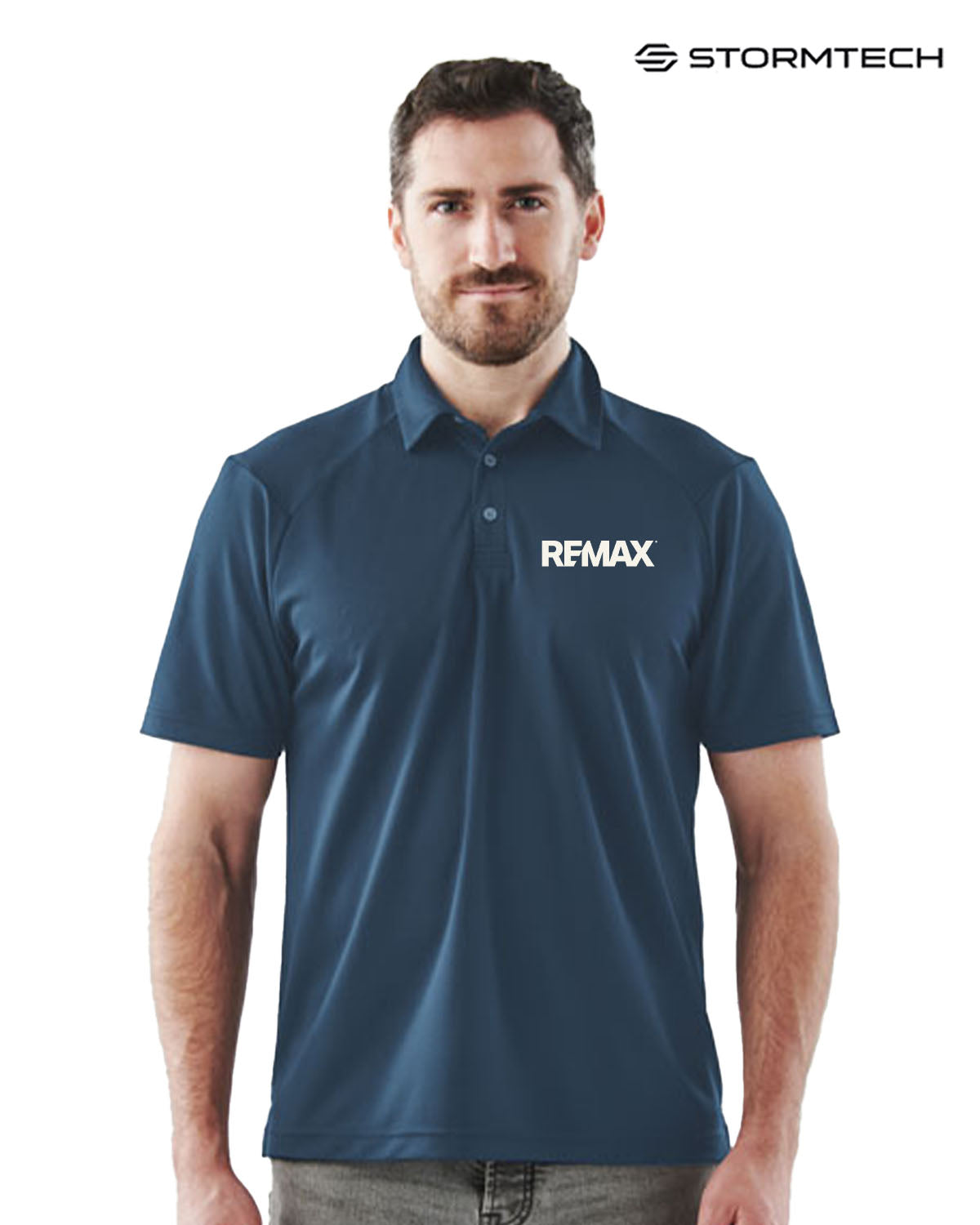 Man wearing a blue polo shirt with REMAX logo on a white background