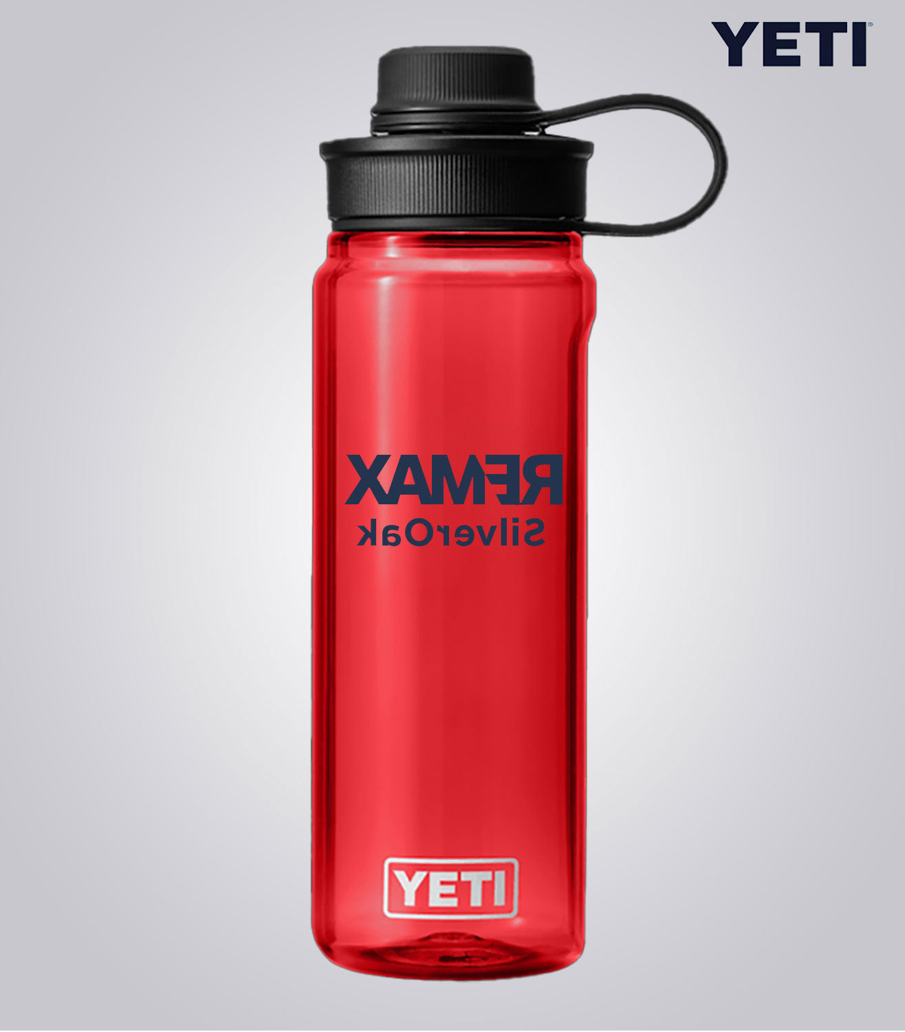 Red YETI water bottle with 'Rambler' text on a gray background