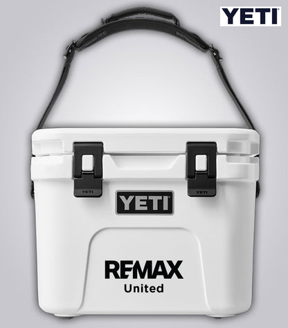 White YETI cooler with Remax branding on a gray background
