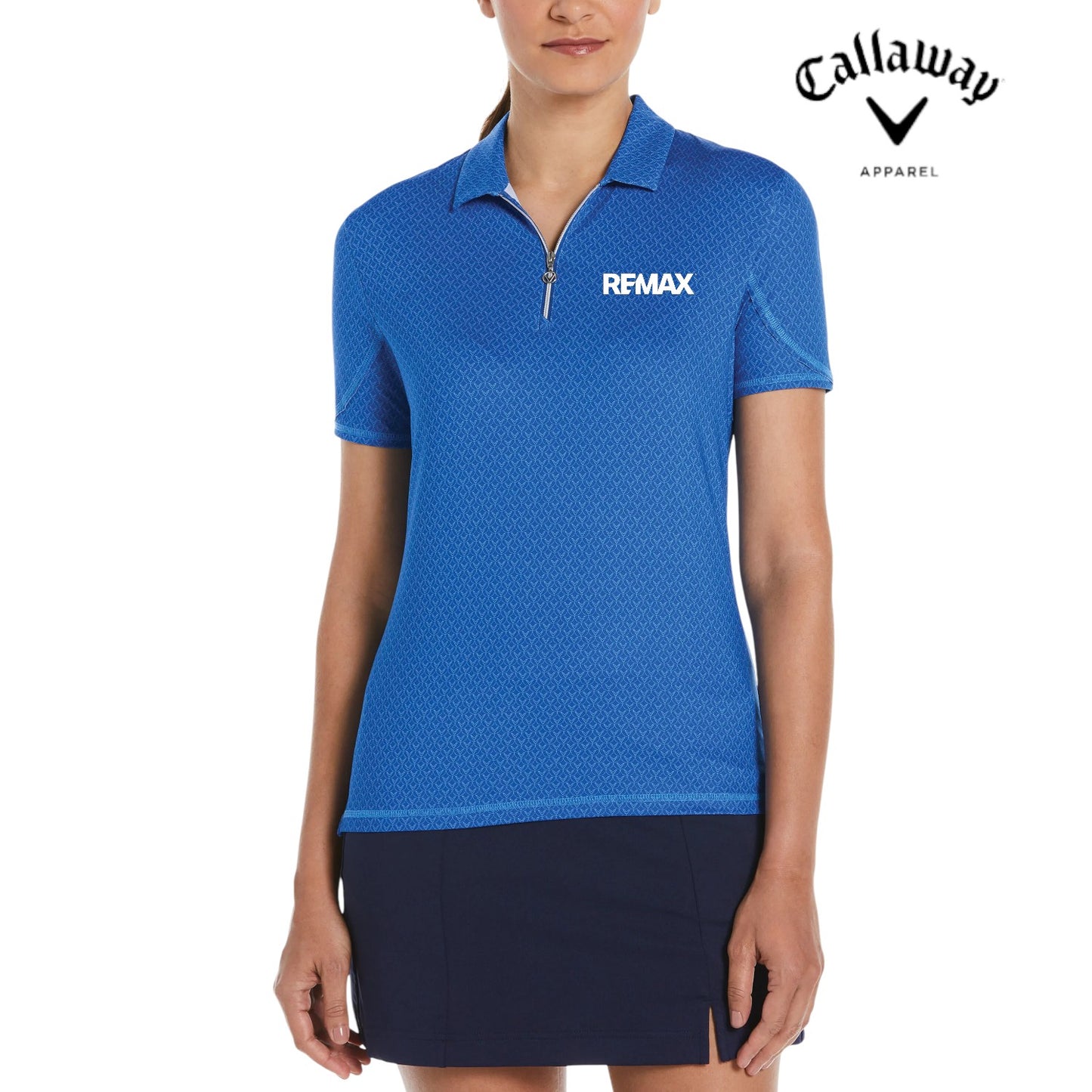 Woman wearing a blue Callaway Remax polo shirt on a white background