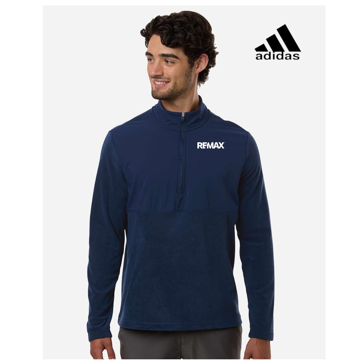 Man wearing a navy blue Adidas jacket with a visible Remax logo on a white background
