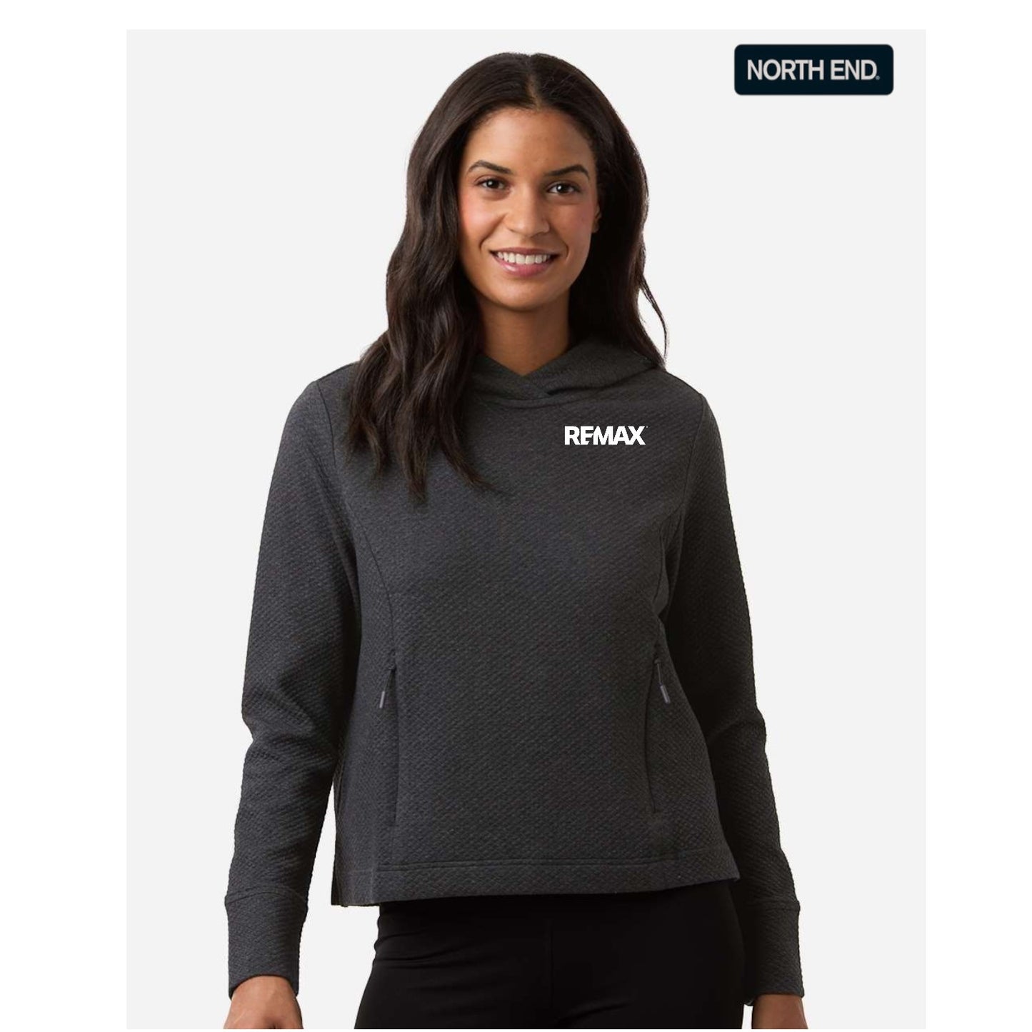 Woman wearing a dark gray hoodie with 'REMAX' logo on a white background