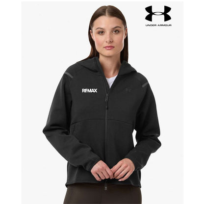 Woman wearing a black hoodie with REMAX logo on a white background, featuring Under Armour logo.