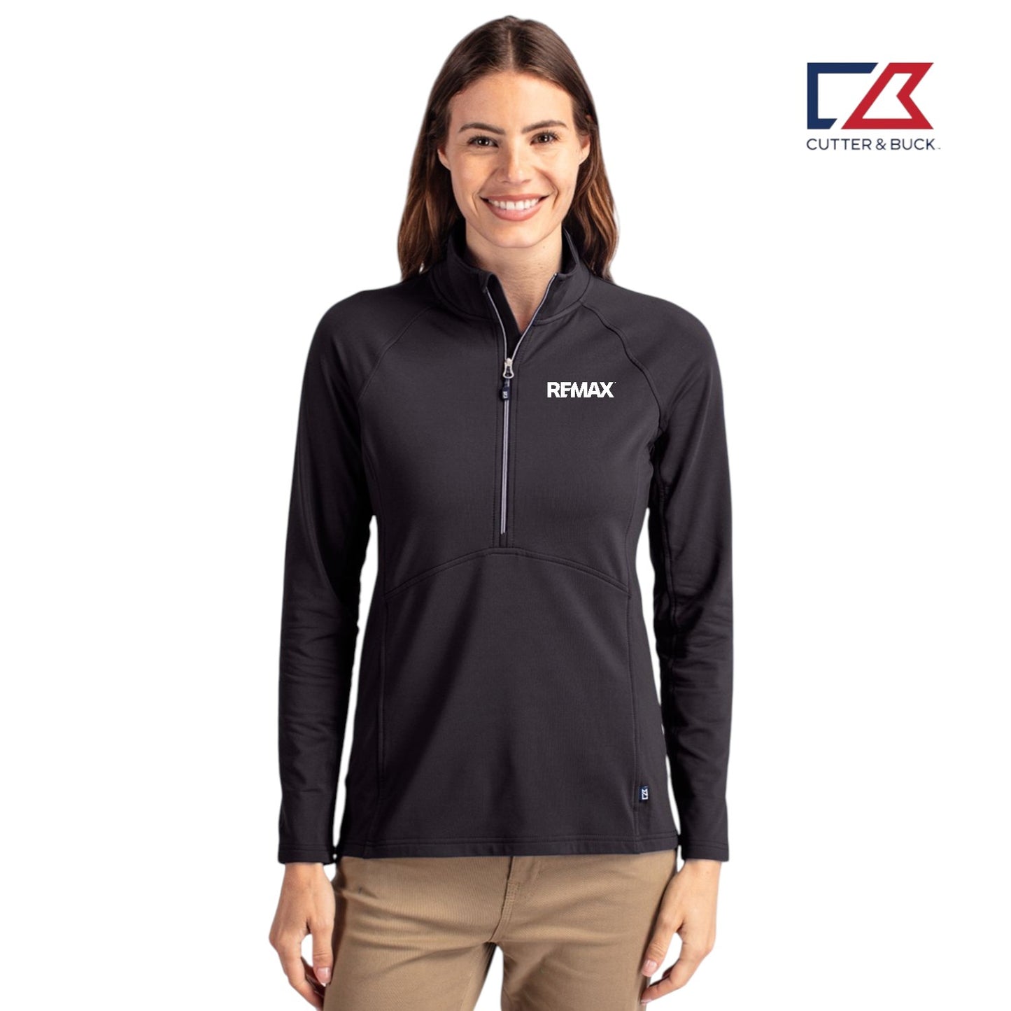 Woman wearing a black jacket with a Remax logo on a white background, featuring the Cutter & Buck brand.
