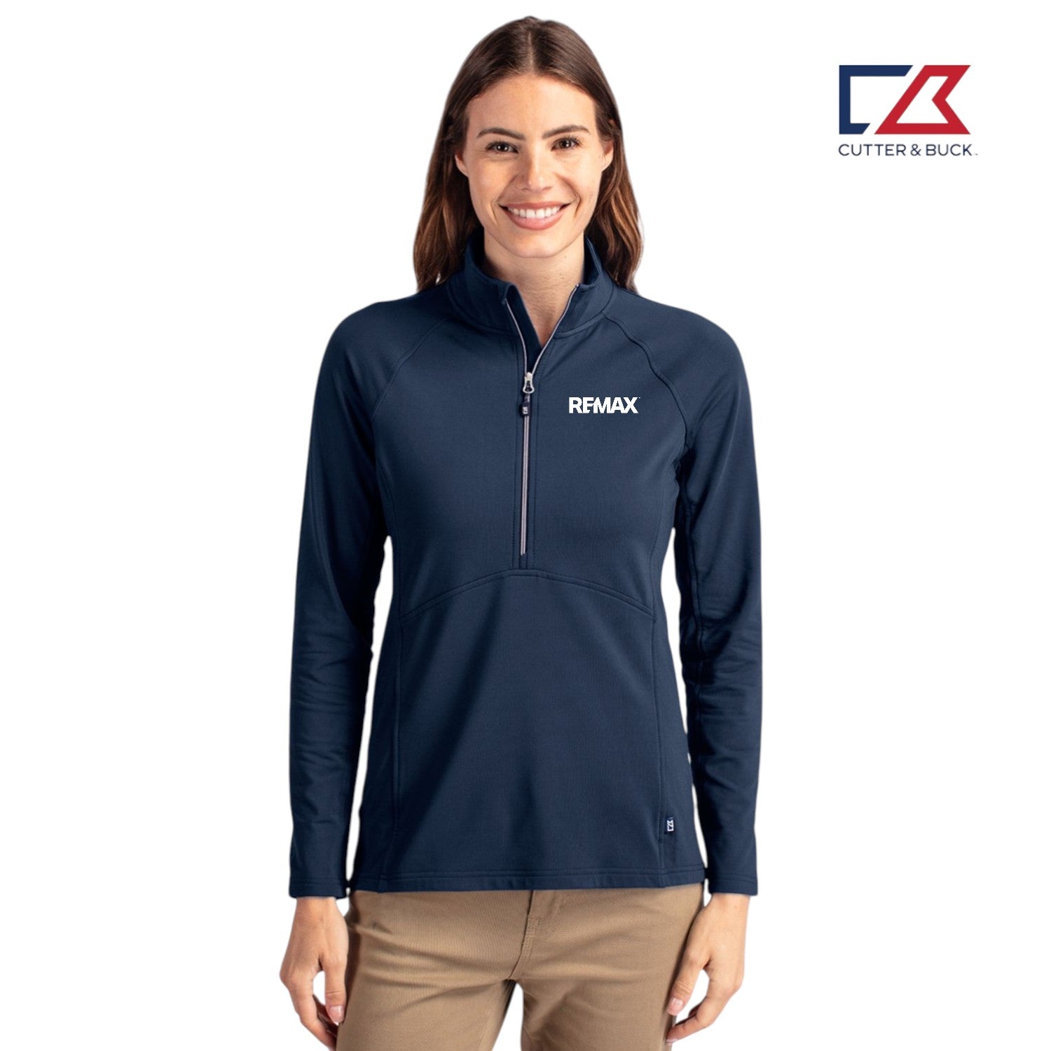 Woman wearing a navy blue pullover with a logo on a white background