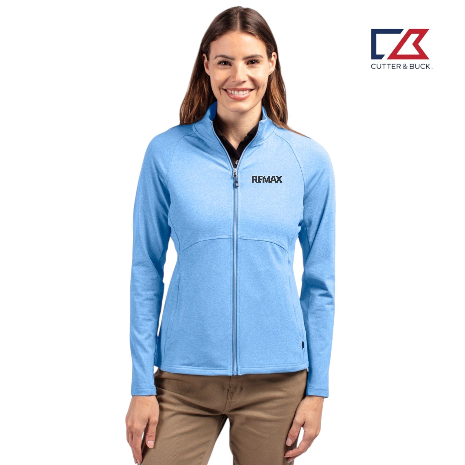 Woman wearing a blue jacket with Remax logo on a white background