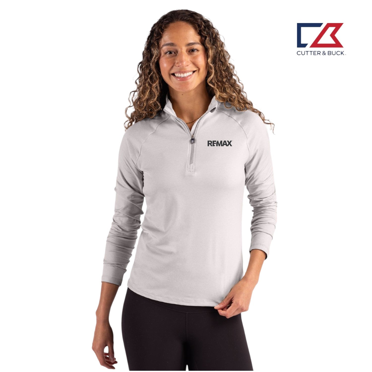 Woman wearing a gray quarter-zip pullover with Remax logo on a white background