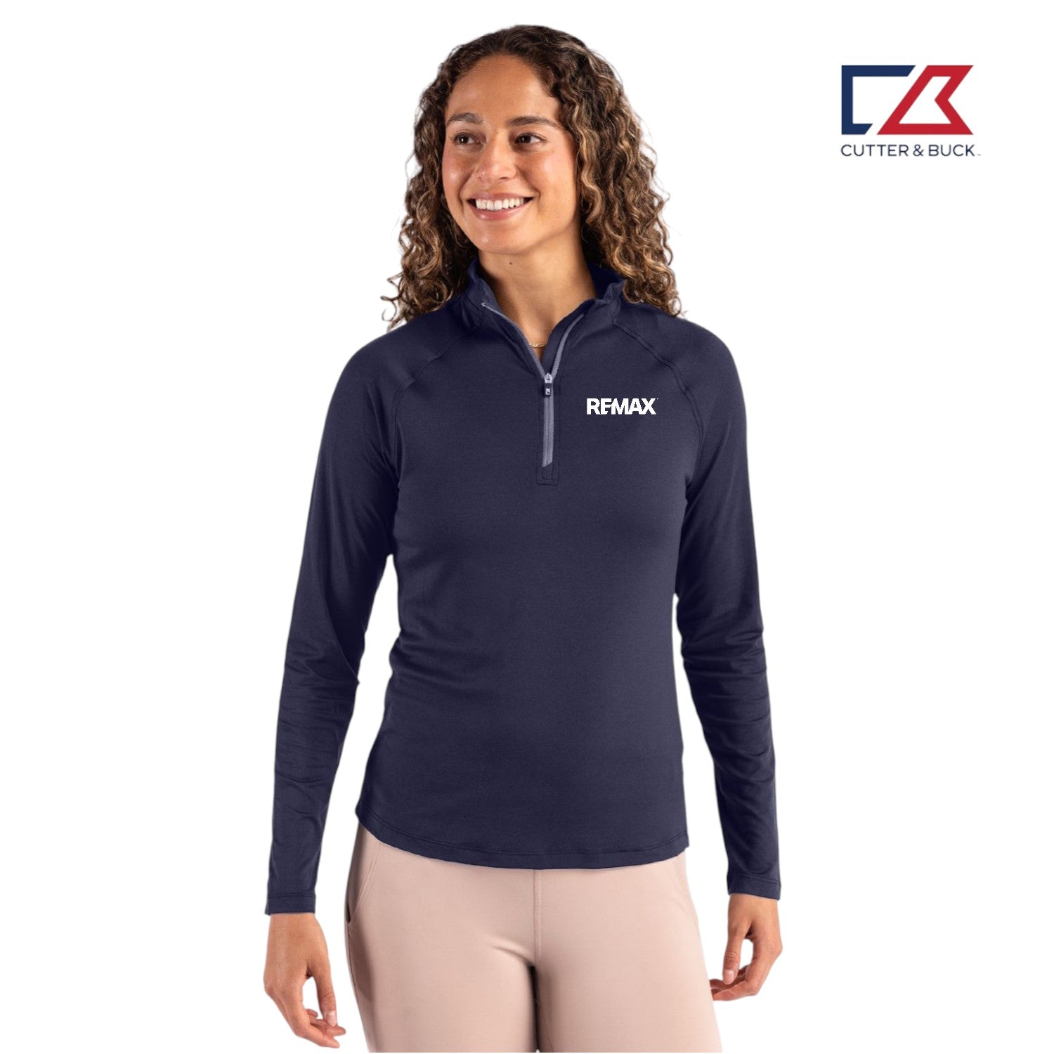 Woman wearing a navy long-sleeve shirt with Remax logo on a white background