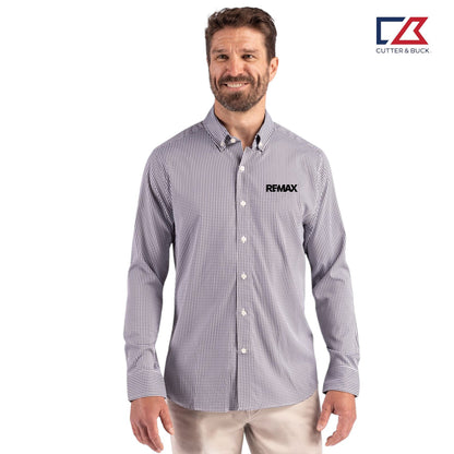 Man wearing a checkered shirt with REMAX logo on a white background