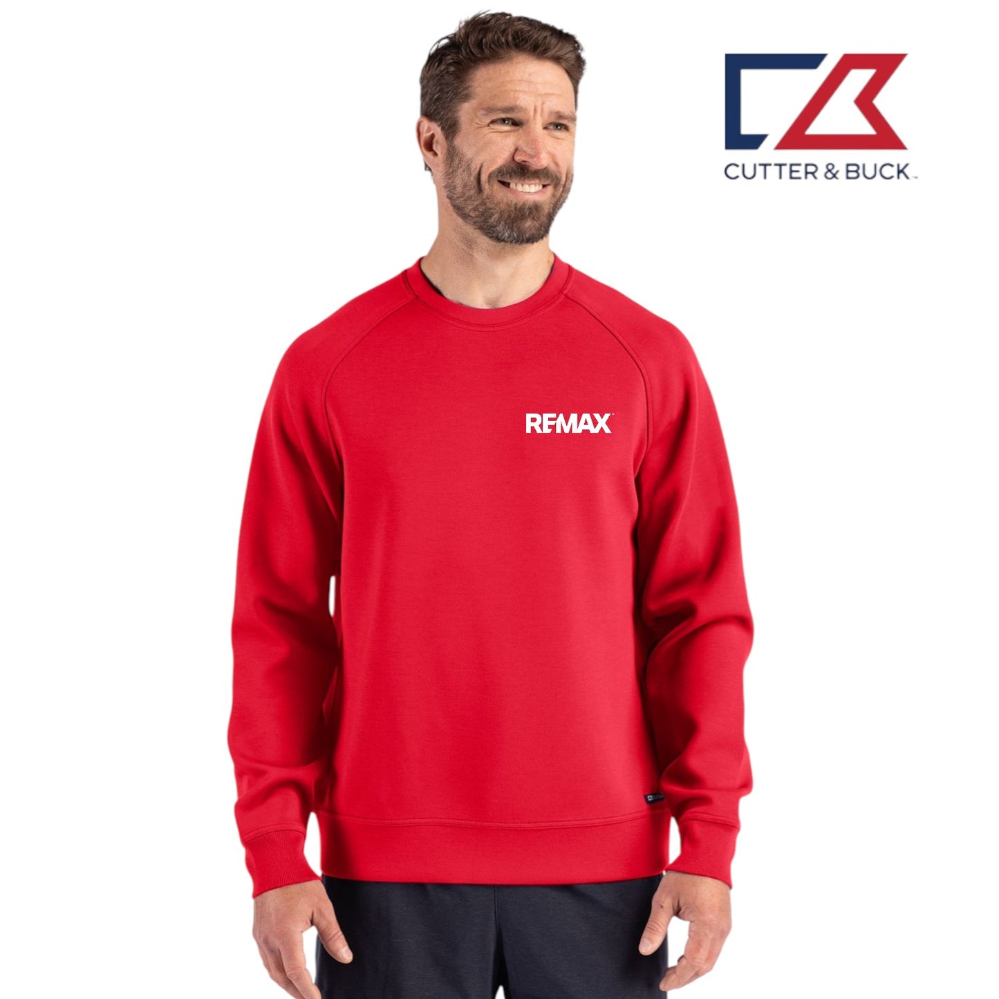Man wearing a red sweatshirt with 'REMAX' logo on a white background, featuring the Cutter & Buck logo.