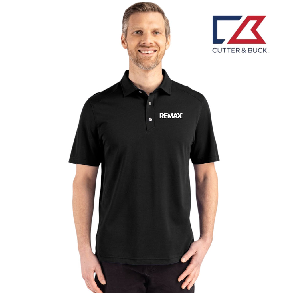 Man wearing a black polo shirt with 'REMAX' logo, standing against a white background with Cutter & Buck logo.