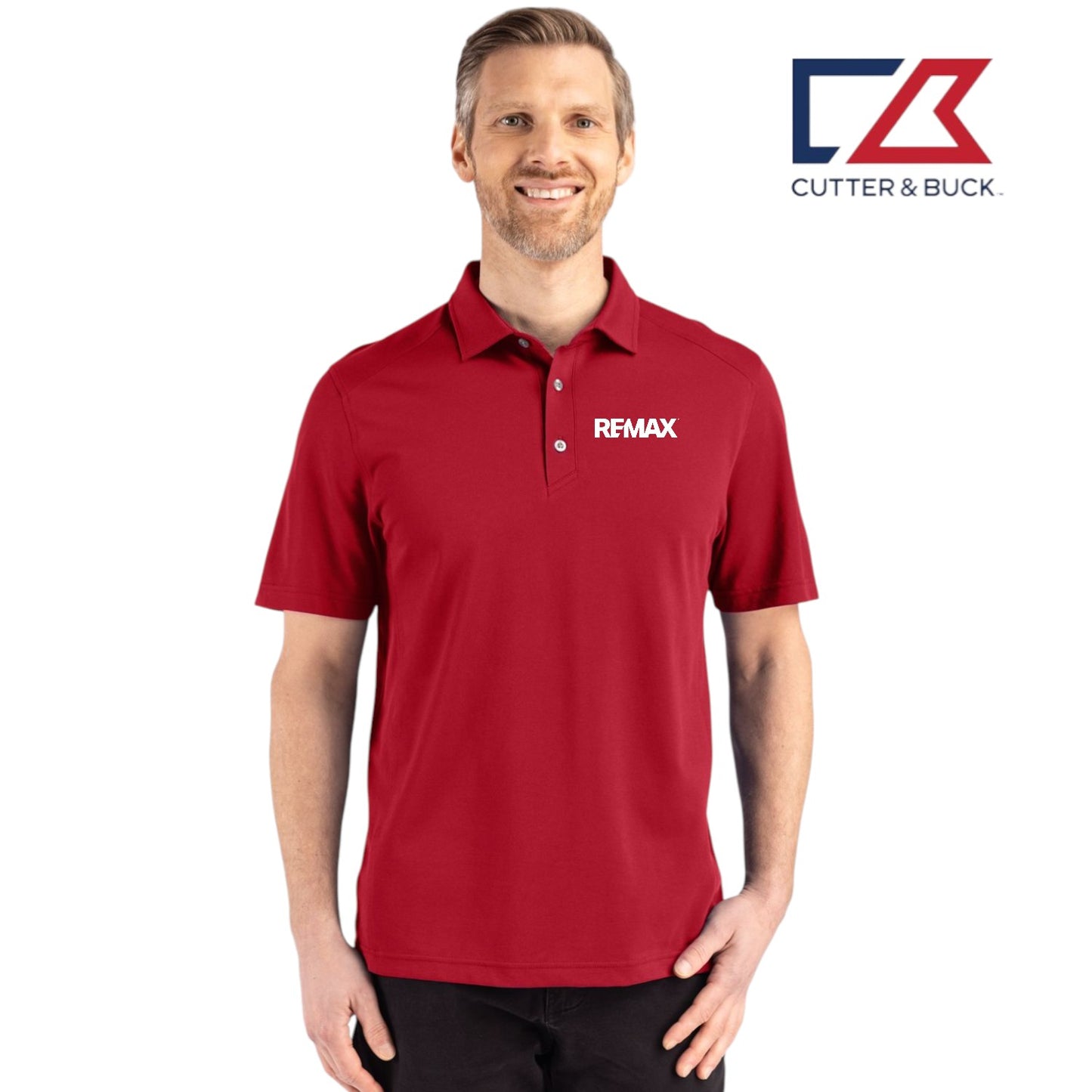 Man wearing a red polo shirt with Remax logo, standing against a white background with Cutter & Buck logo.