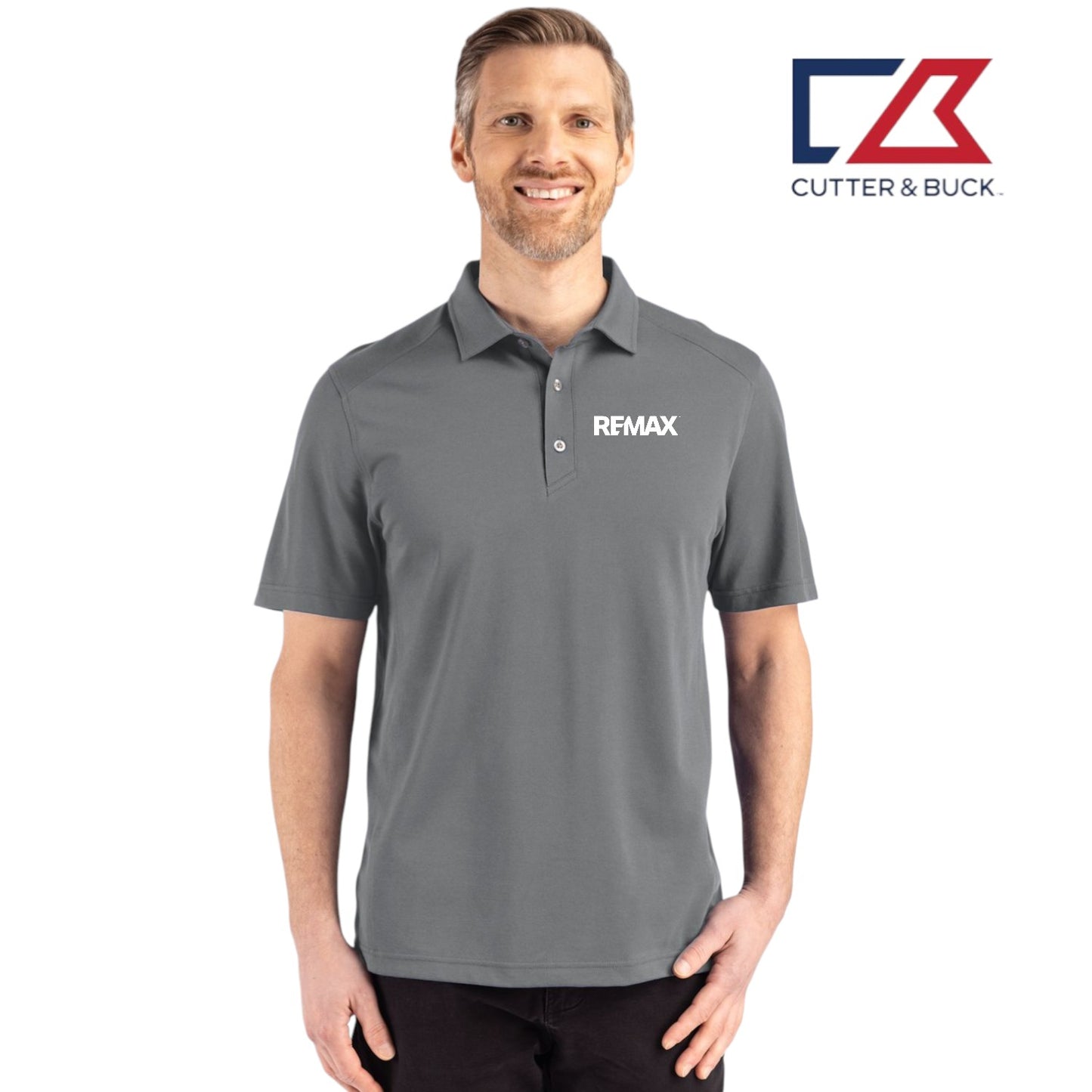 Man wearing a gray polo shirt with a logo on a white background, featuring the Cutter & Buck brand.