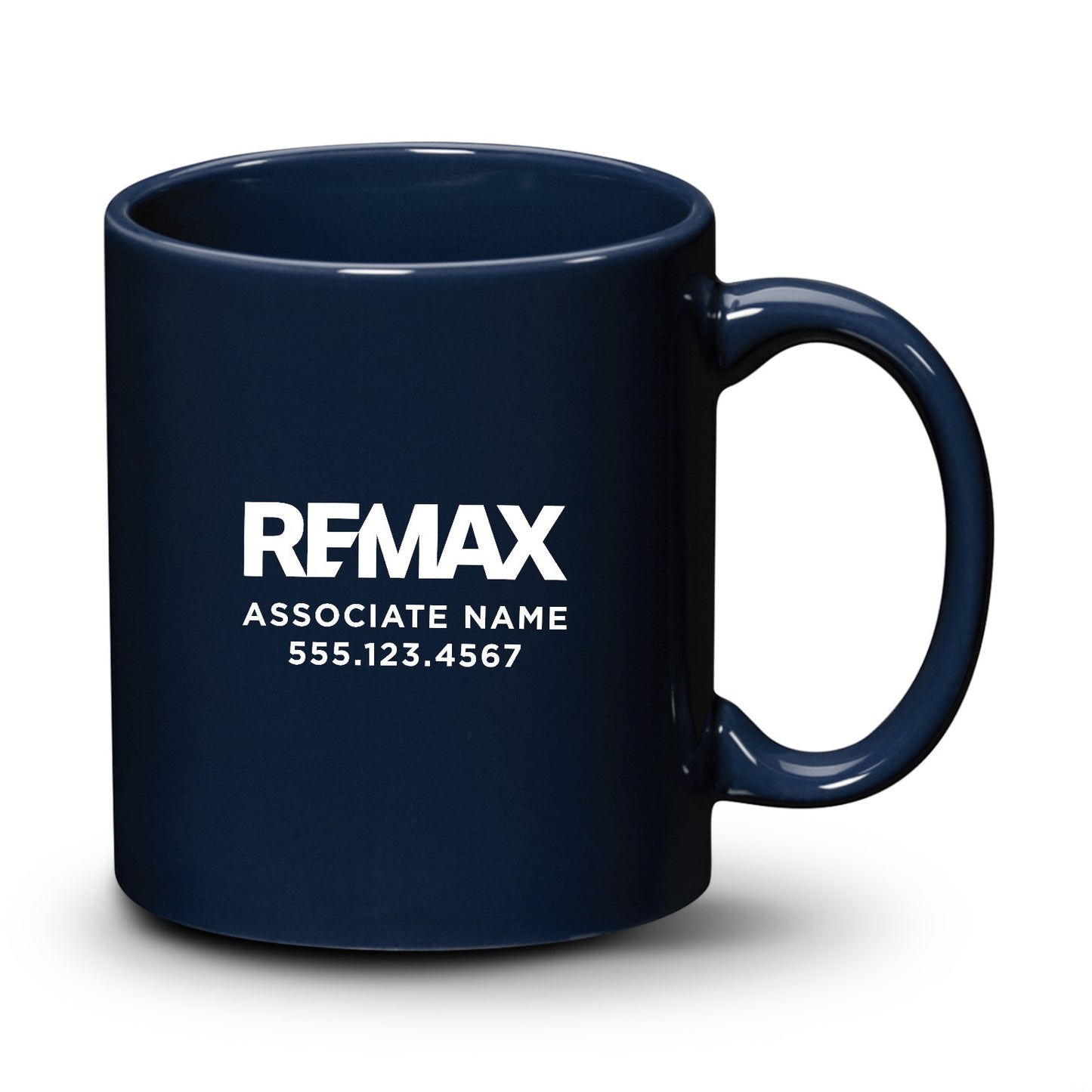 Navy blue mug with REMAX branding and contact information on a white background