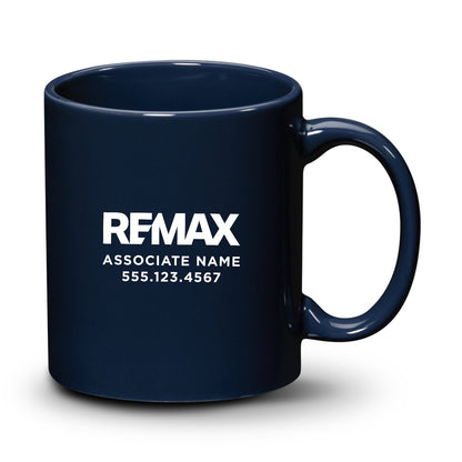 Navy blue mug with REMAX branding and contact information on a white background