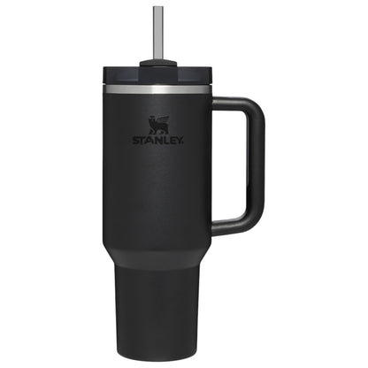 Black Stanley mug with handle and straw on a white background