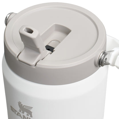 Close-up of a white insulated tumbler with a lid on a white background