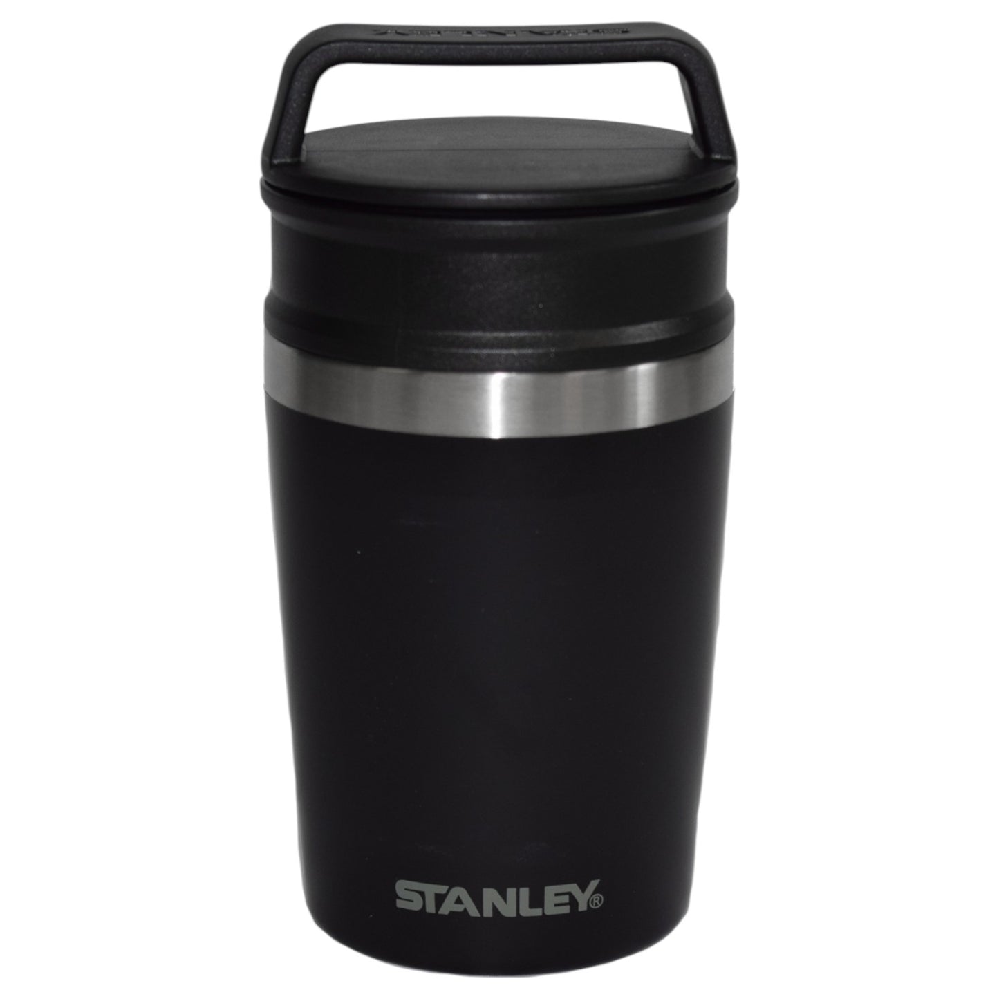 Black Stanley insulated mug with a silver rim on a white background