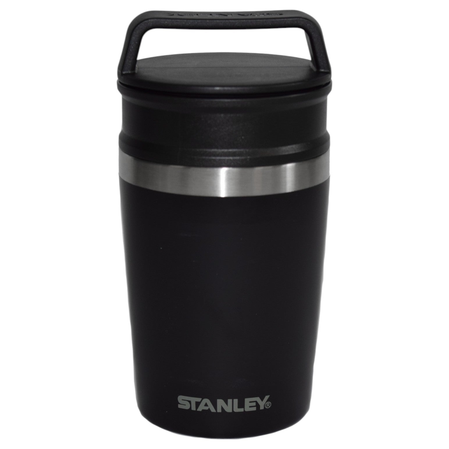 Black Stanley insulated mug with a silver rim on a white background