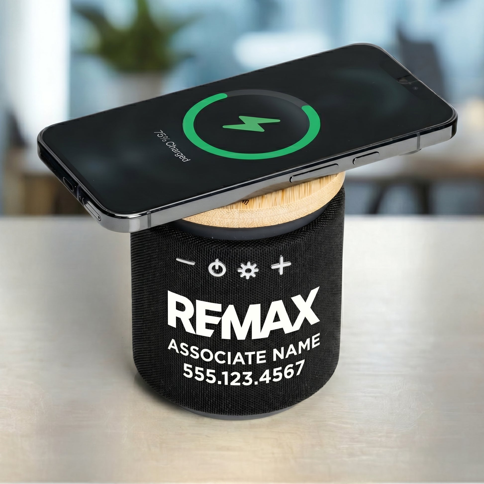 Bluetooth speaker with a wooden charger head on top