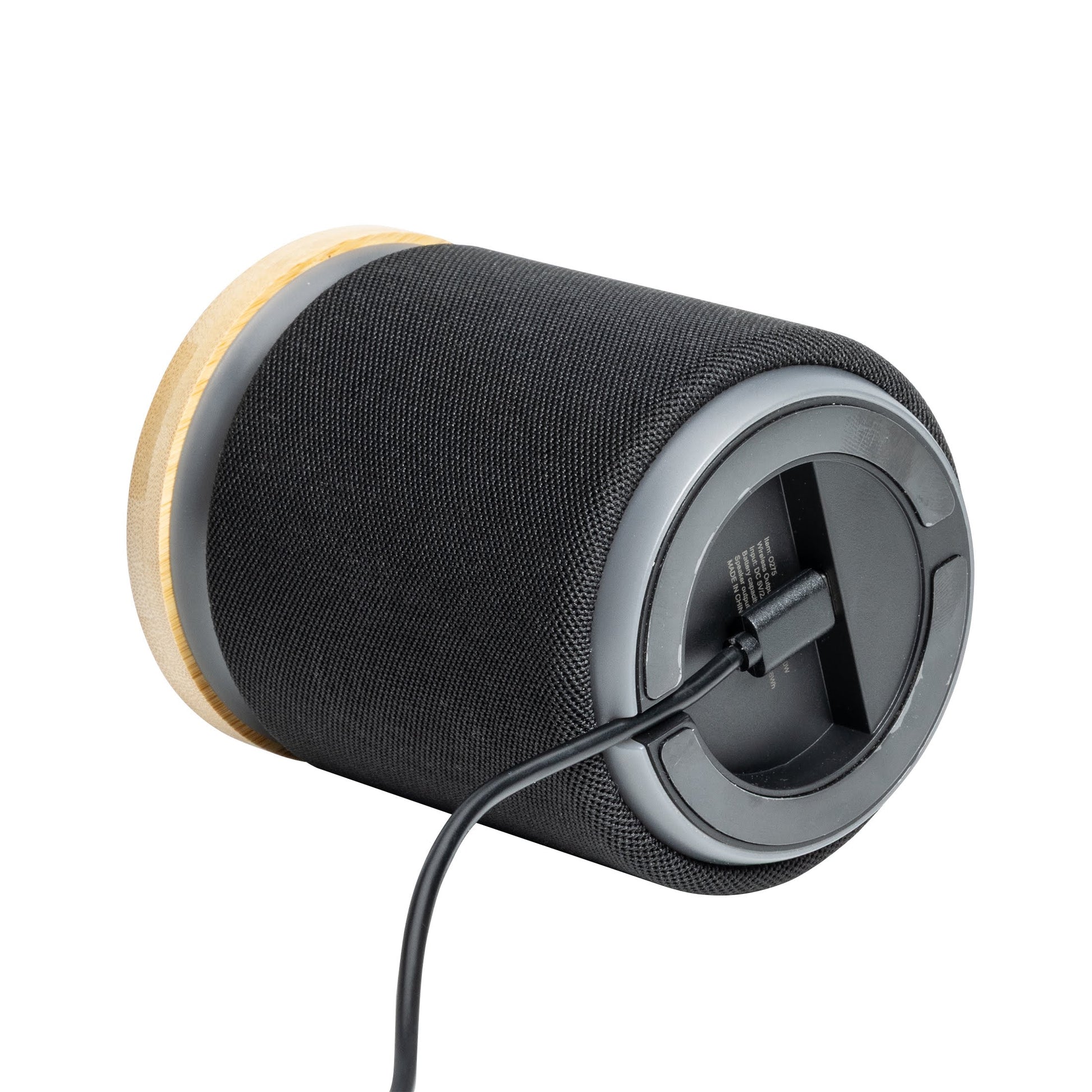 Bluetooth speaker with a wooden charger head on top