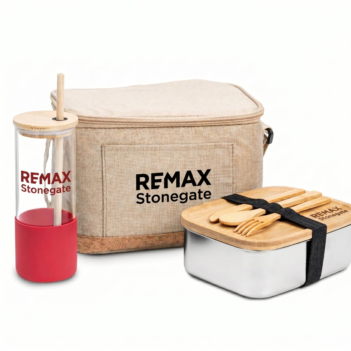 Outdoor picnic set with REMAX Stonegate branding including a cooler bag, tumbler, and lunch box.