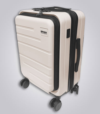 Beige suitcase with black handles and wheels on a light gray background
