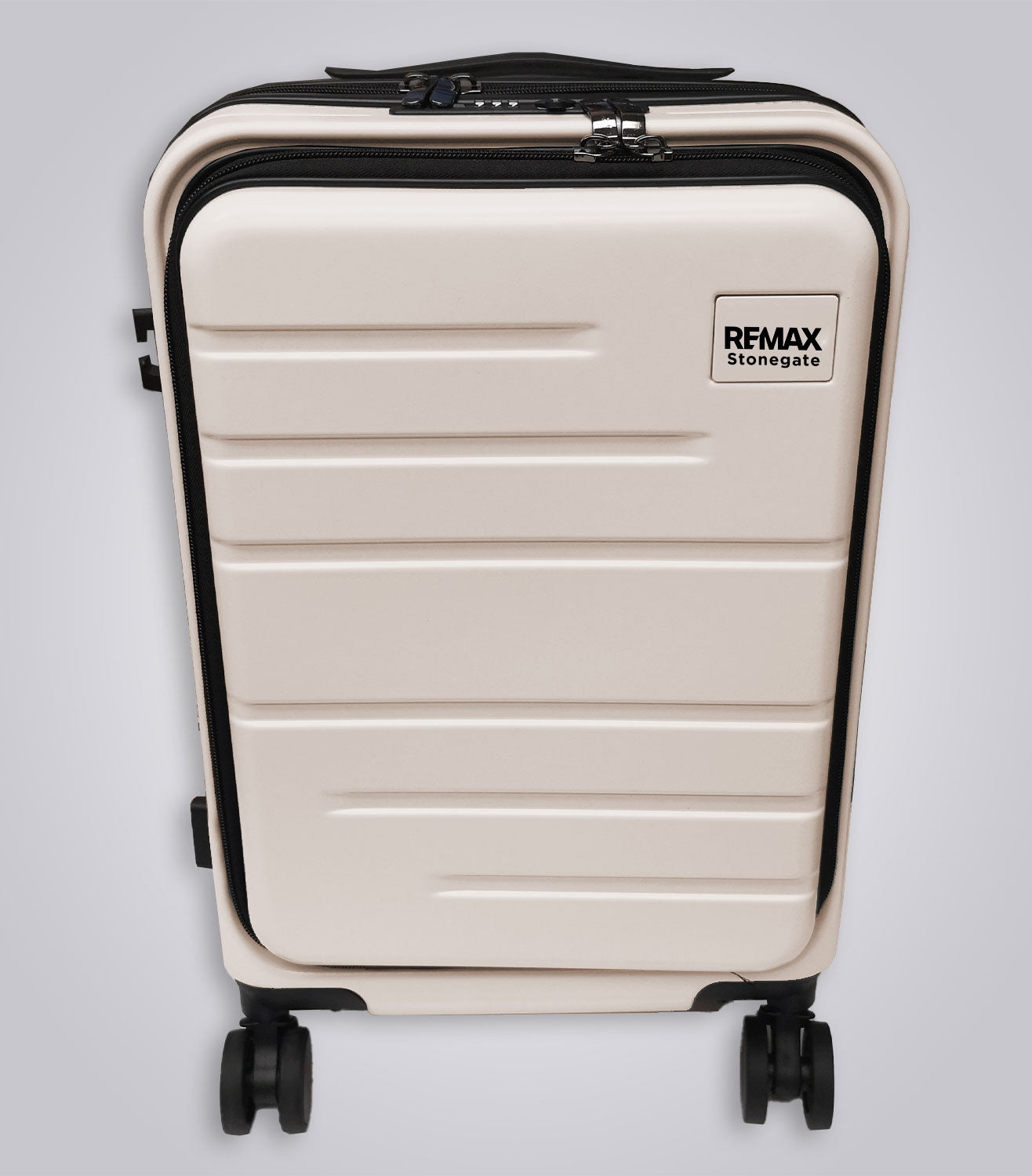 Beige suitcase with black accents on a light gray background