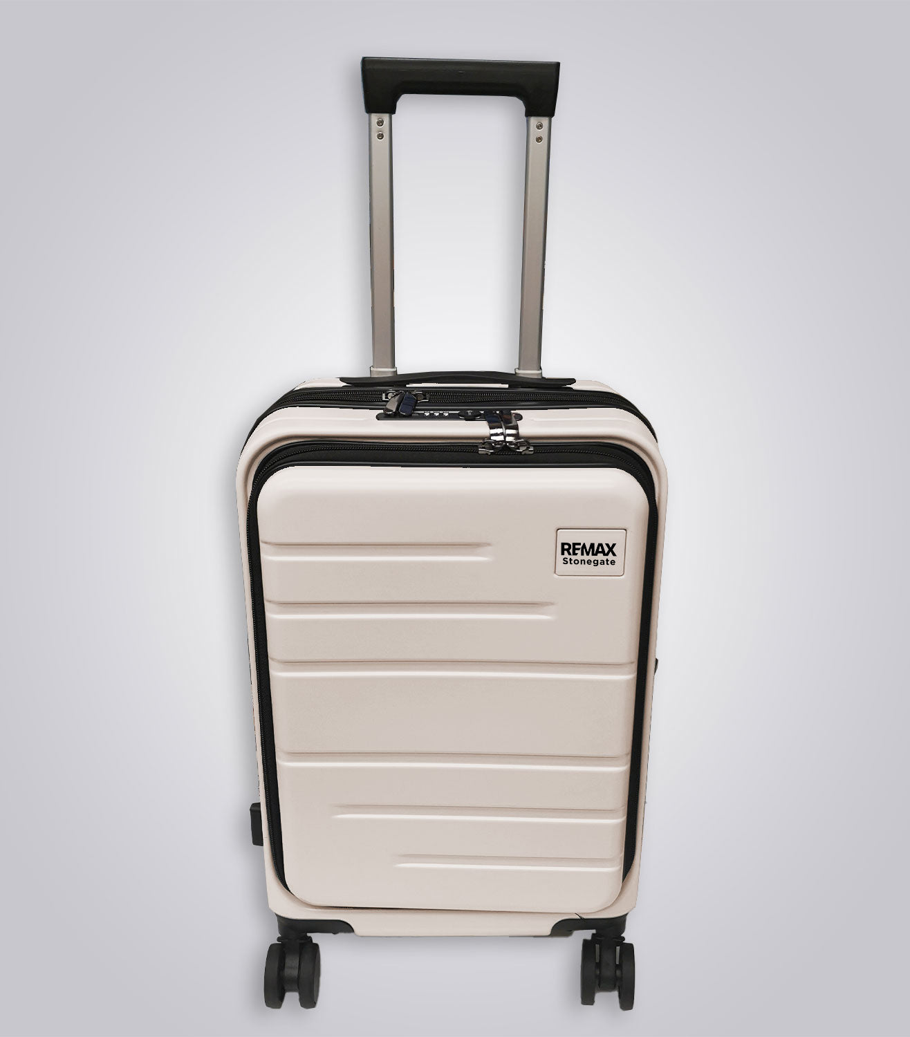 Beige suitcase with a black handle on a light gray background