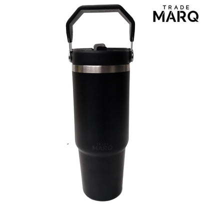 Black insulated mug with handle on a white background, featuring the Trade Marq logo.