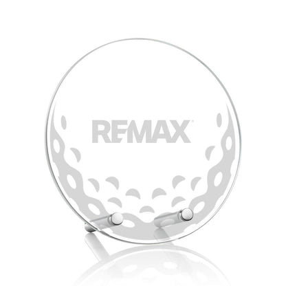 Round metallic object with 'REMAX' branding on a white background